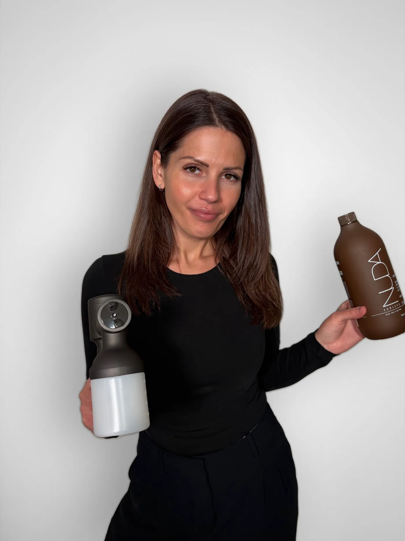 Ana Maria, NUDA certified spray tan artist at GLOW17