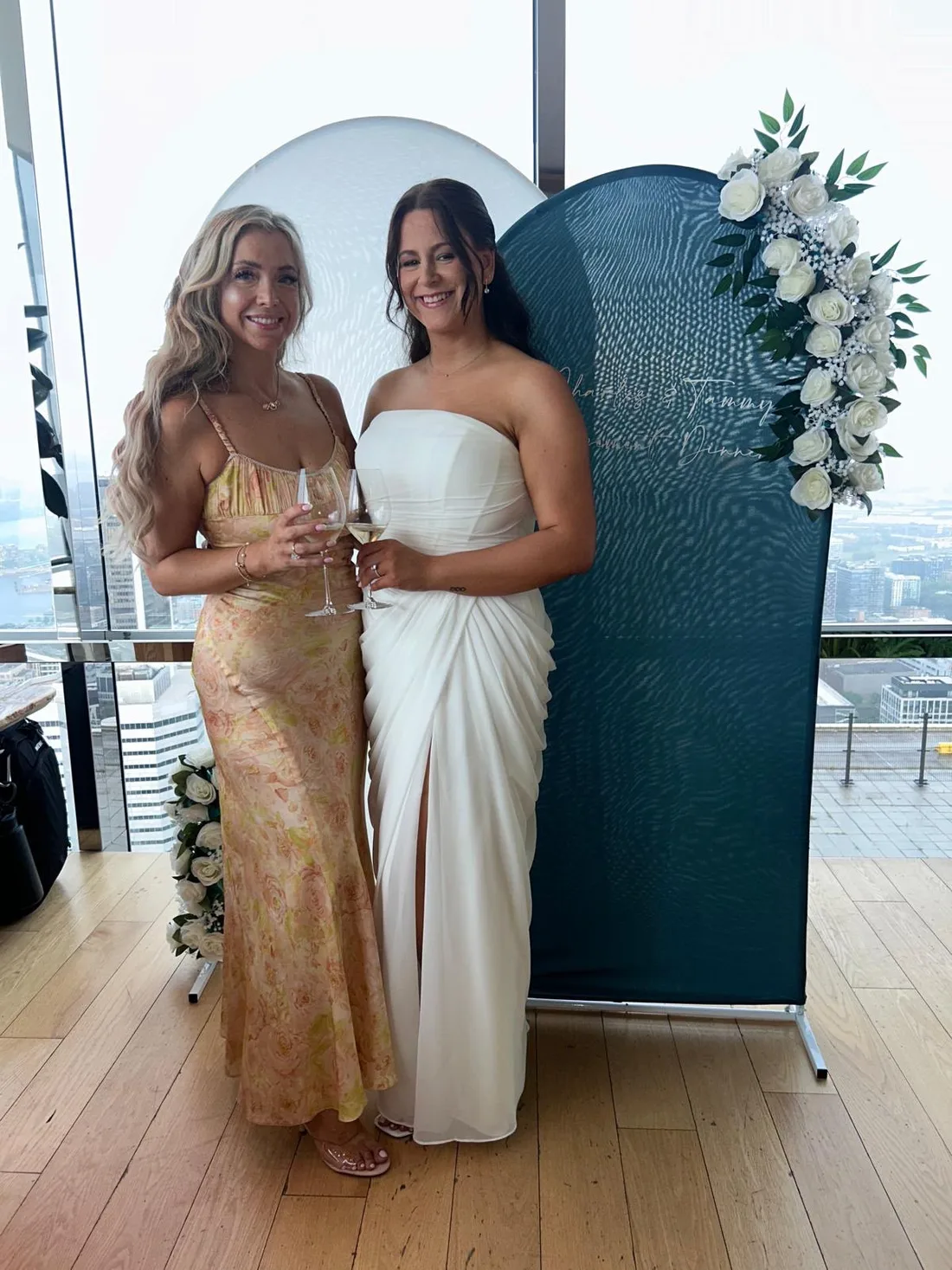 Bride in a white dress with her guest, both tanned by GLOW17