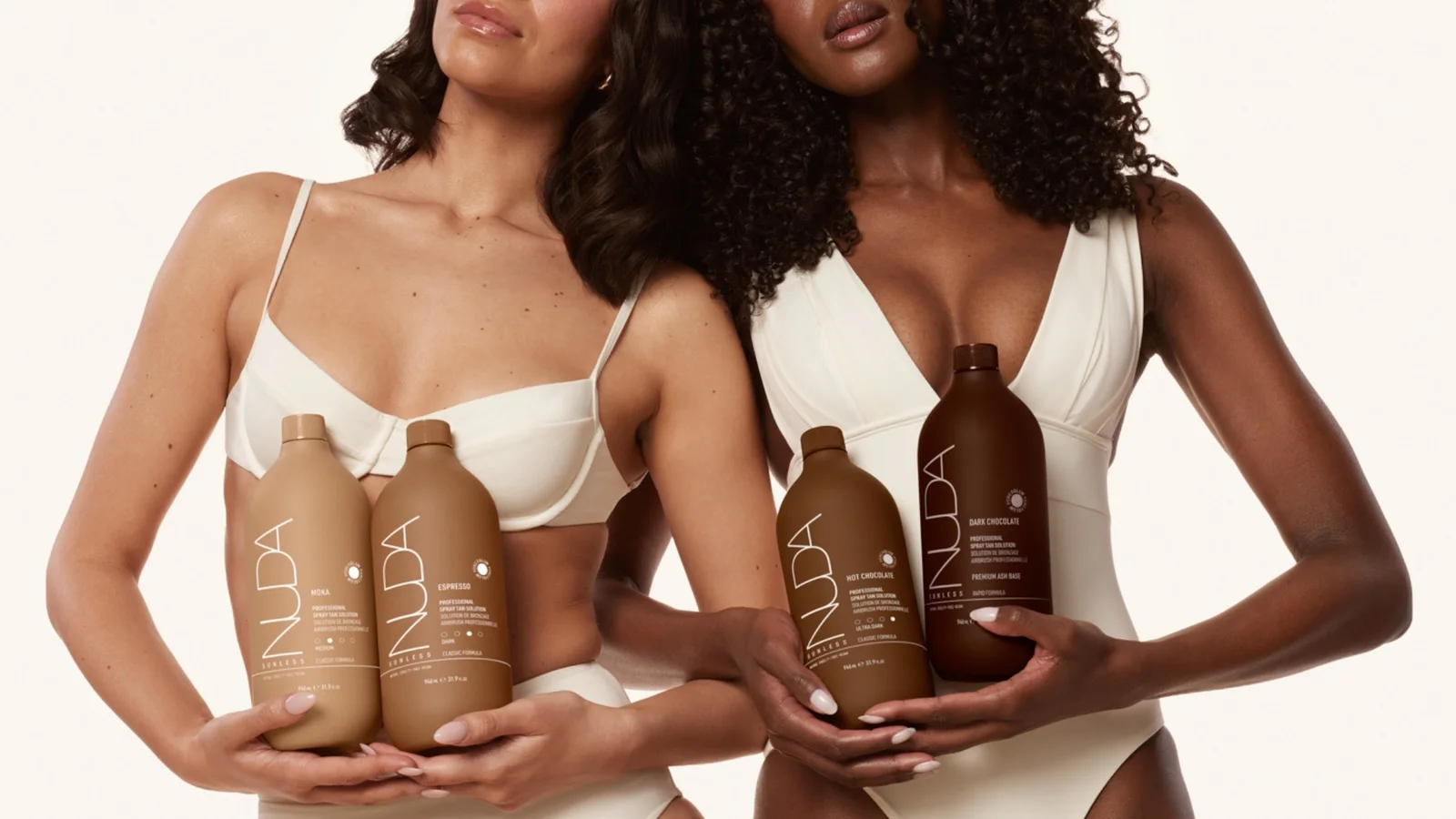 NUDA product being applied during a GLOW17 spray tan