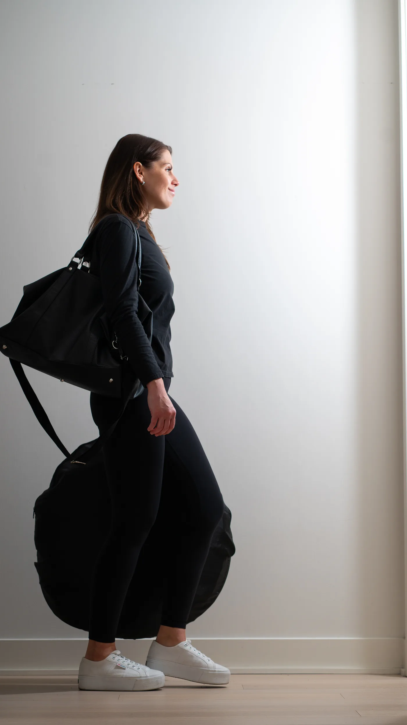Ana Maria of GLOW17 on her way with her kit, mobile spray tan in Montreal